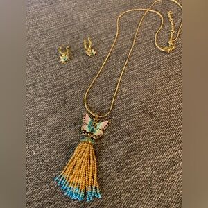 Gold, blue and purple butterfly necklace and earrings.